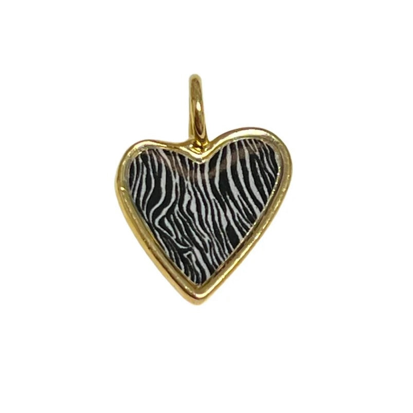 Nínive Charms