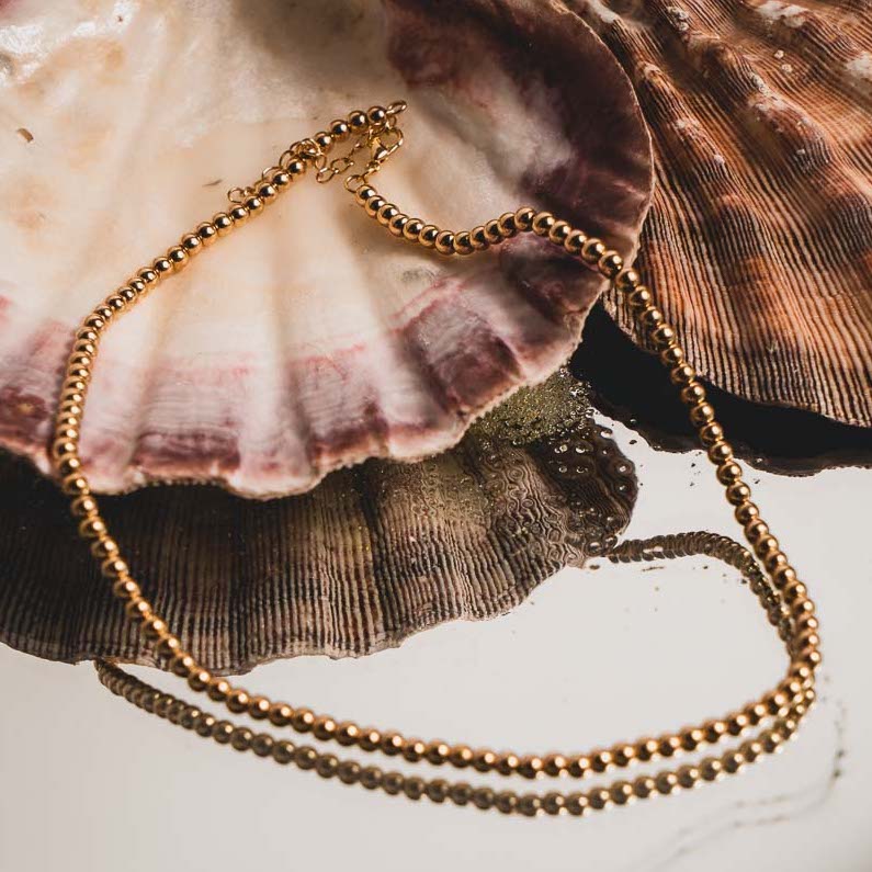 Deluge Gold Necklaces