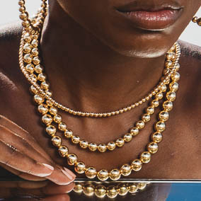 Deluge Gold Necklaces